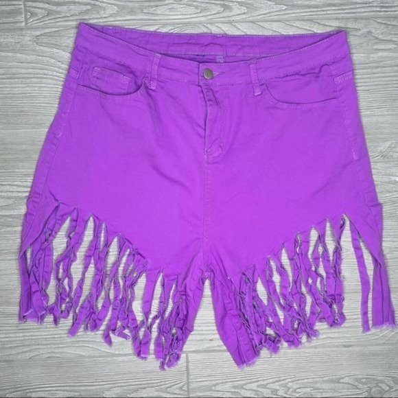 Neon fringe shorts 18 inches approximately flat lay around a large funky fringe